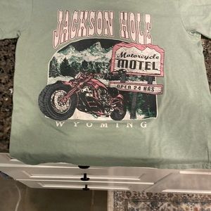 A green graphic t shirt